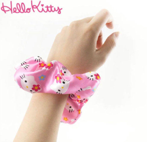 Heisei Retro Hello Kitty Scrunchie Celebrate 50 years of cuteness with this pink accessory.